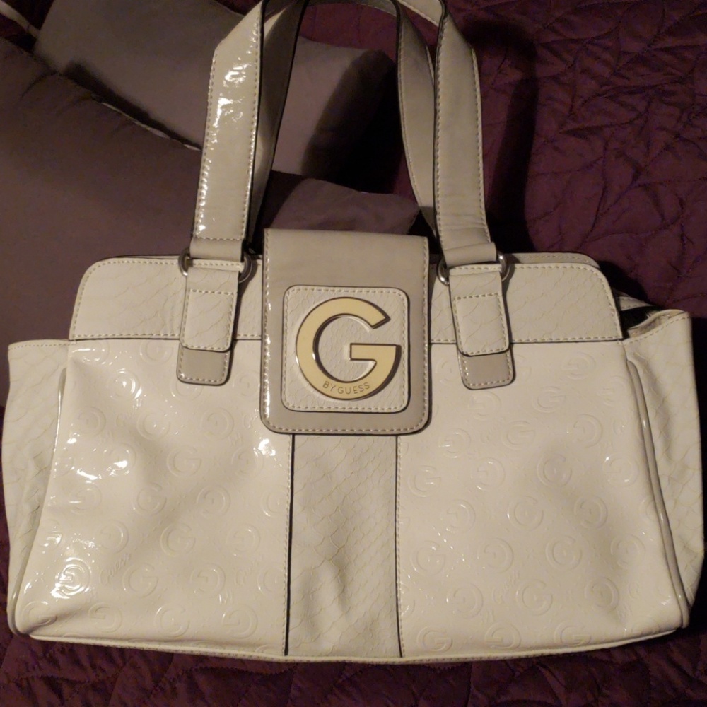 Stunning white Guess purse.